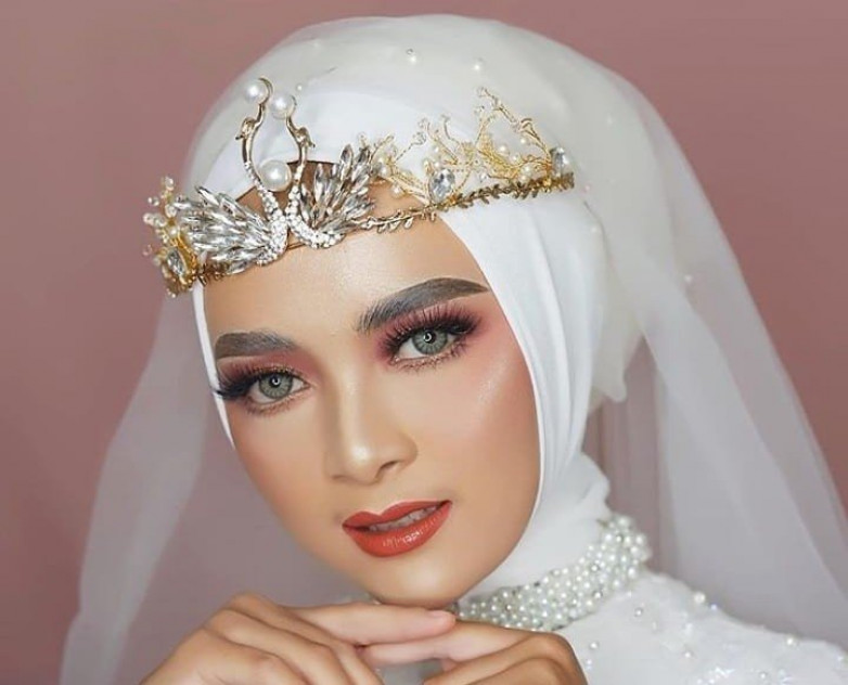 rias pengantin Sumatera Selatan